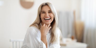 a woman smiling for the camera