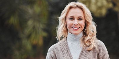 a woman smiling for the camera