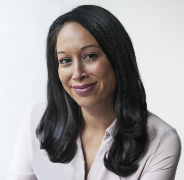 a woman smiling for the camera