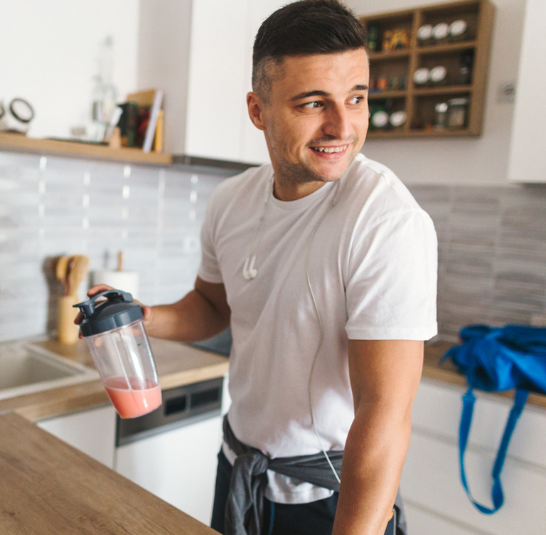 a man standing in a kitchen