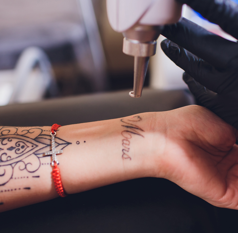 a close up of a tattoo on a persons hand