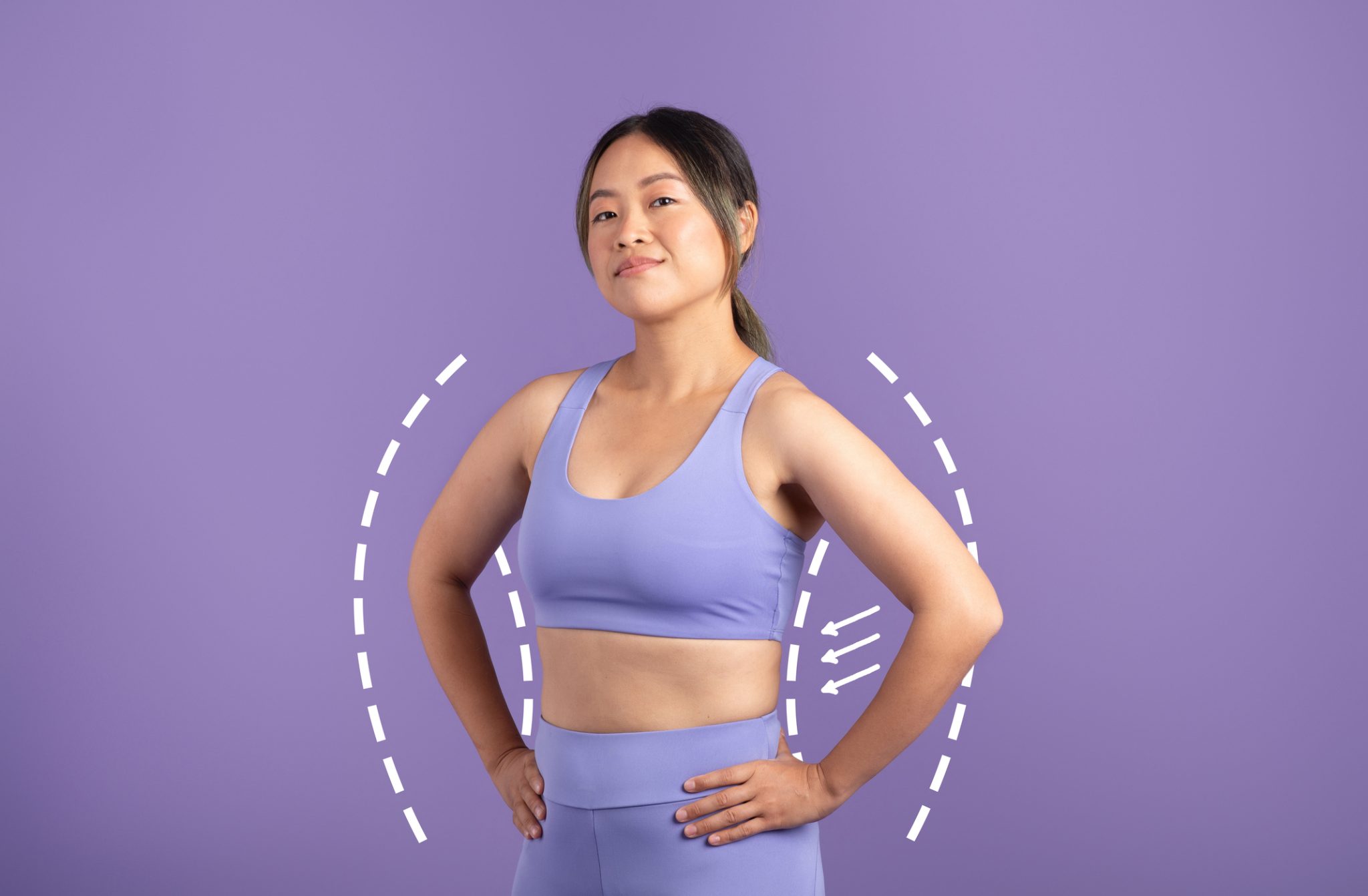 Woman in workout clothing representing body contouring candidacy and realistic results at a Tuscaloosa medspa.